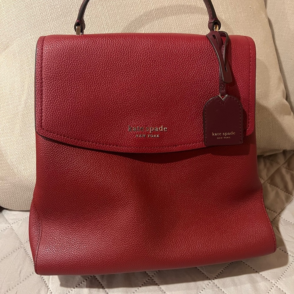 Kate Spade pebbled leather Thompson top handle red backpack